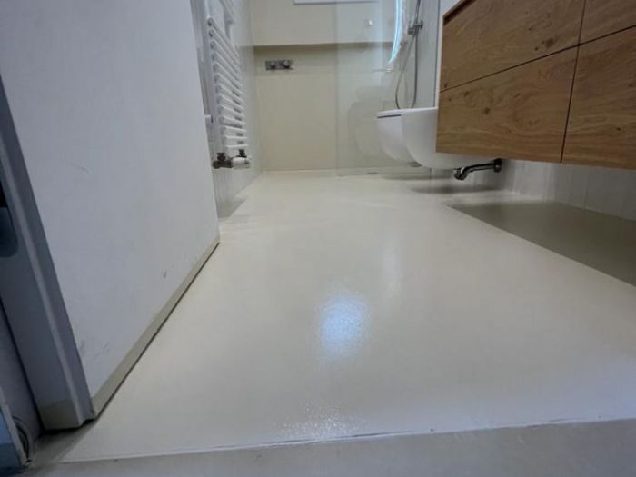 Archisio - Assopav Srl - Progetto Rivestimento bagno in resina