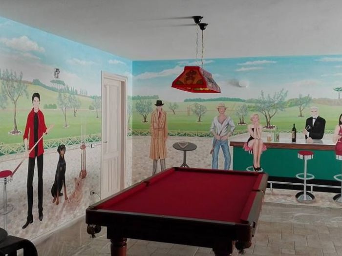 Archisio - Edyta Komar - Progetto Decorazione di parete di un ristorante di una sala hobby in una sala da gioco e allestimento per show-room per unazienda nel settore moda