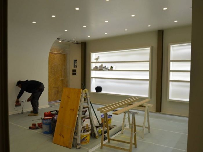 Archisio - Decora srl - Progetto Ristrutturazione negozio di abbigliamento