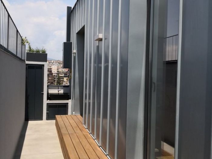 Archisio - Alfio Carmelo Lombardo - Progetto Structured attic with aluminum frames and glass titanium zinc cover