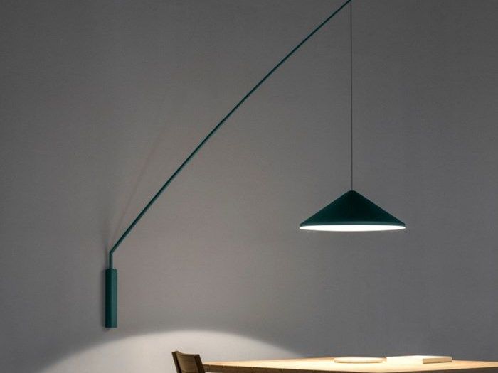 Archisio - Paola Illuminazione - Progetto La bellezza di un illuminazione da parete per un tavolo