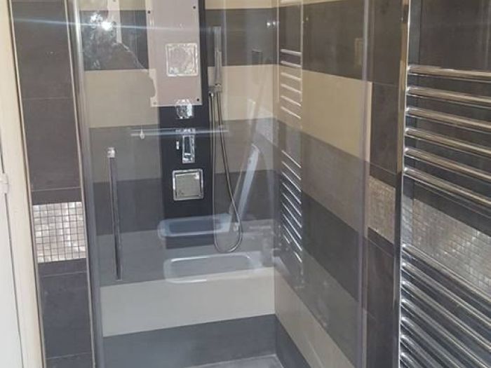 Archisio - Tortoglass - Progetto Vetri doccie e ringhiere di vetro