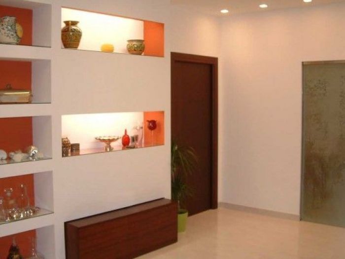 Archisio - Adesign - Progetto Parete attrezzata