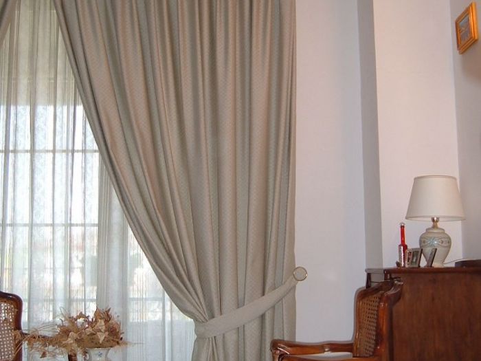 Archisio - Pezzoni Tappezzeria Tendaggi - Progetto Tende