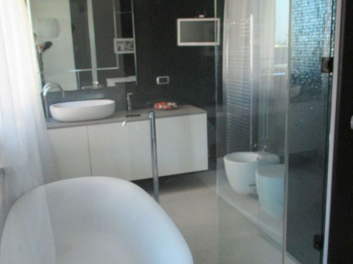 Archisio - Alessandro Restori - Progetto Accorpamento di due unita immobiliari interior design