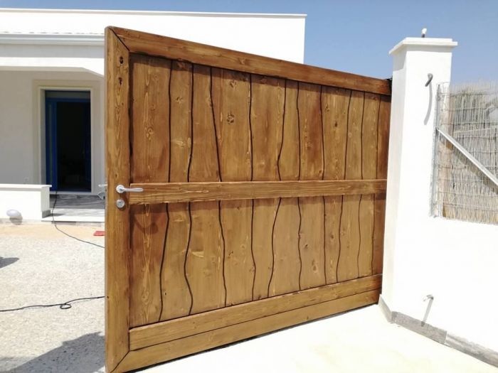 Archisio - Falegnameria Tuccitto - Progetto Porte in legno