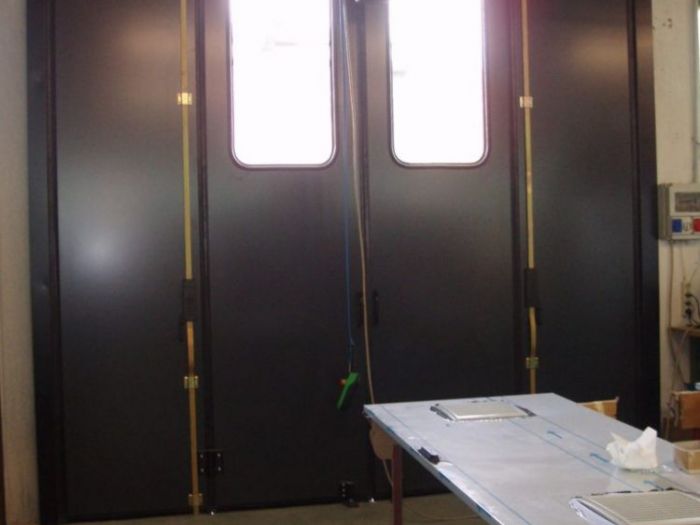 Archisio - Gr Porte - Progetto Porte industriali - porte a libro e porte scorrevoli industriali