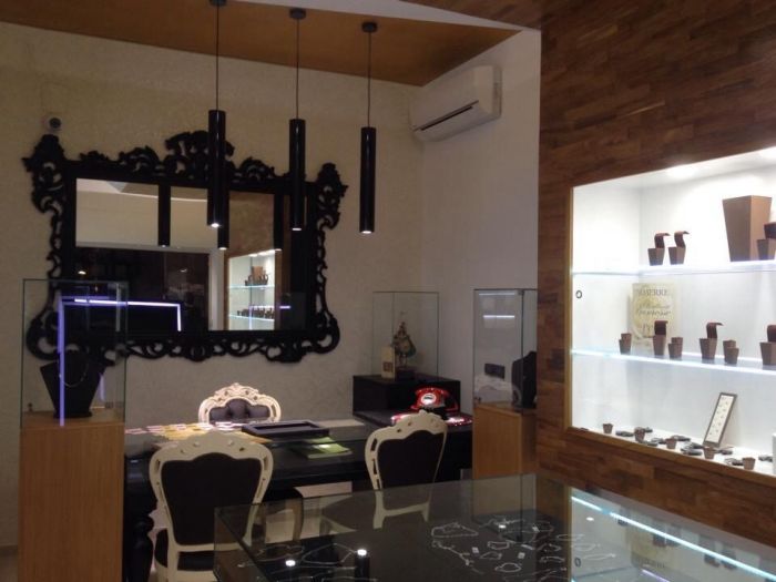 Archisio - Casesa Tiziano - Progetto Gioielleria piazza oro