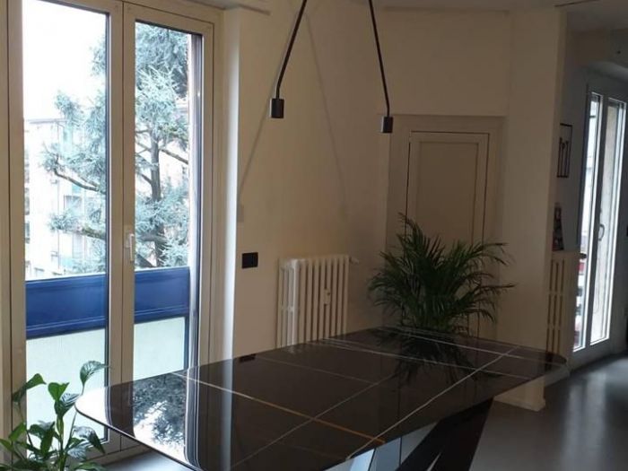 Archisio - Paola Illuminazione - Progetto Soluzione tavolo da pranzo