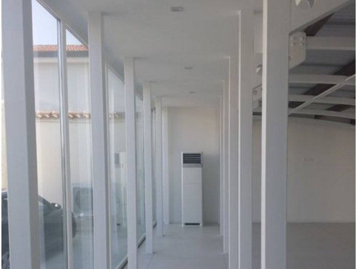 Archisio - Quadrifoglio Group Impresa Edile - Progetto Ampliamento in ferro e vetro