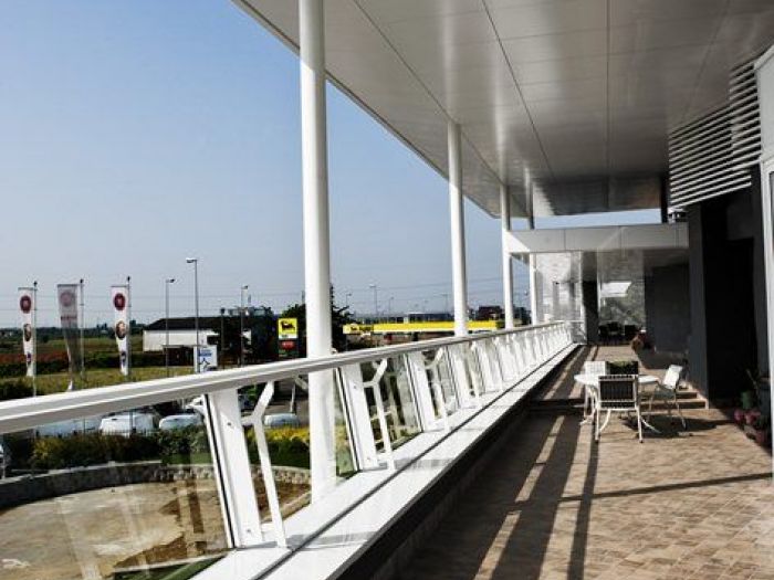 Archisio - Studio Merlini - Progetto Commercial building - restyling edificio commerciale