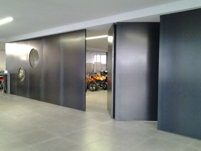 Archisio - Bravo Servizi Aziendali Di Bravo Maurino - Progetto Allestimento interno concessionaria