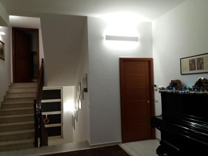 Archisio - Paola Illuminazione - Progetto Illuminazione salone e scale