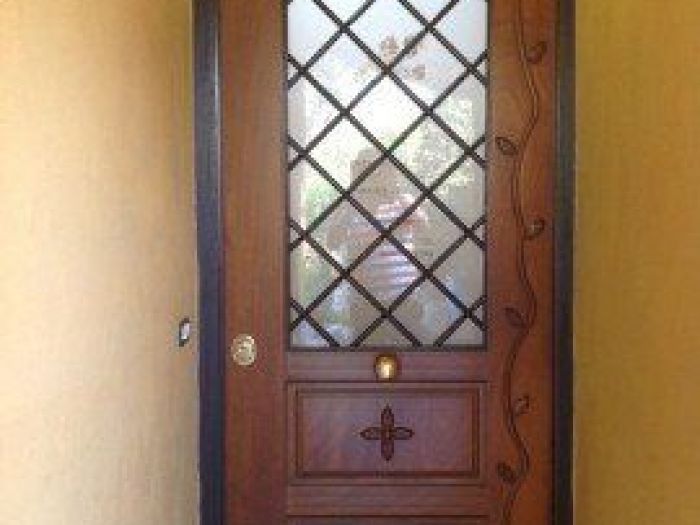 Archisio - Conika srl - Progetto Porte