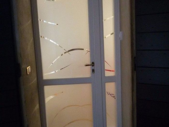 Archisio - Vetreria Dimensione Vetro - Progetto Parapetti e scale pensiline in vetro porte calpestabili e vetri decorati