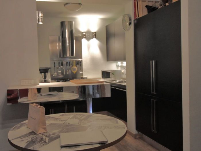 Archisio - Diletta Evangelisti - Progetto Bilocale con dettagli in vetro e metallo argento