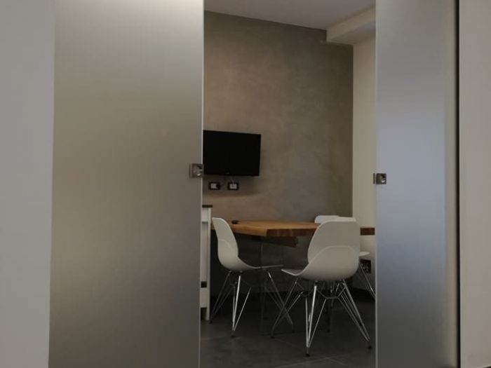 Archisio - Vetreria Flower Glass - Progetto Parapetti e porte scorrevoli