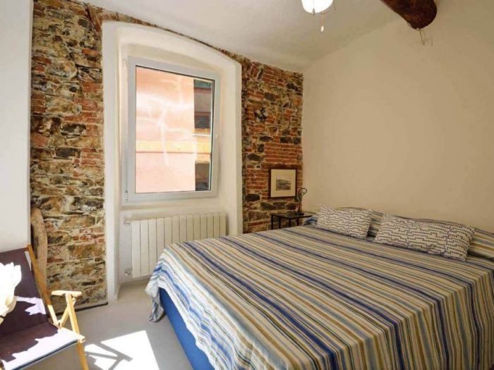 Archisio - Roberto Silvestri - Progetto Una casa a camogli storie e pareti colorate