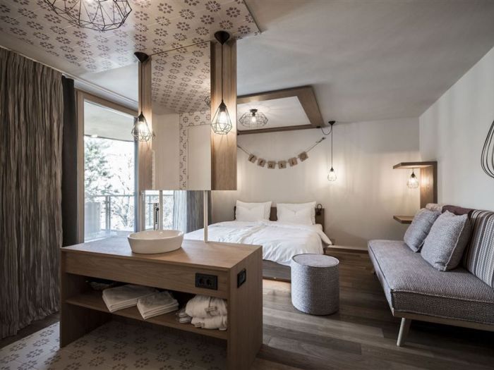 Archisio - Noa Network Of Architecture - Progetto Tofana racchiudendo la natura in se stesso