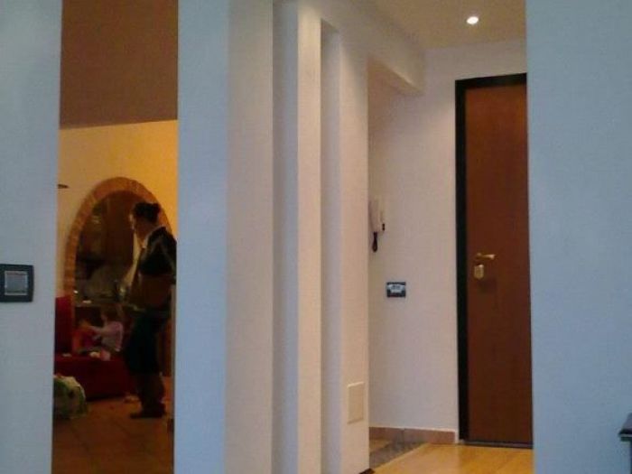 Archisio - Emanuela Rombi - Progetto Fusione di due appartamenti