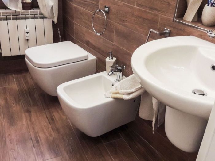 Archisio - Mc Rendering Solution - Progetto il bagno si fa in due