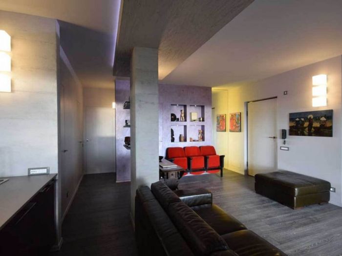 Archisio - Roberto Silvestri - Progetto Pareti in cemento luci a led e colori decisi