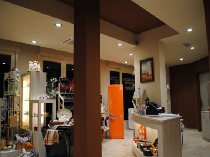 Archisio - Cotto Arredamenti - Progetto Abbigliamento e articoli regalo