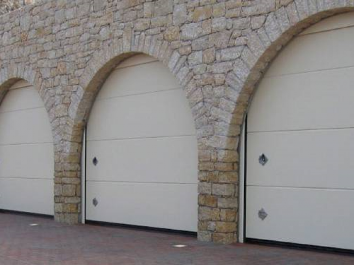 Archisio - Portoni Sezionali Teg - Progetto Portone sezionale in acciaio