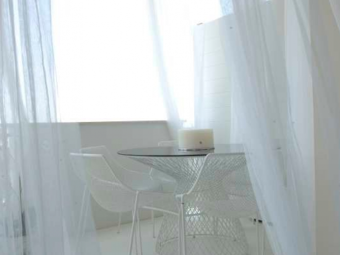 Archisio - Stefano Bernardi - Progetto Bianco assoluto - ristrutturazione e arredamento di un appartamento a milano marittima