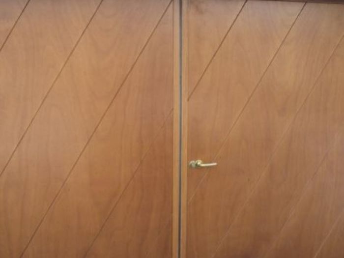 Archisio - Porte Basculanti Bonetalli Maurizio - Progetto Serrande e portoni in legno