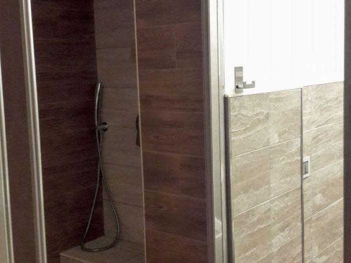 Archisio - Mc Rendering Solution - Progetto il bagno si fa in due