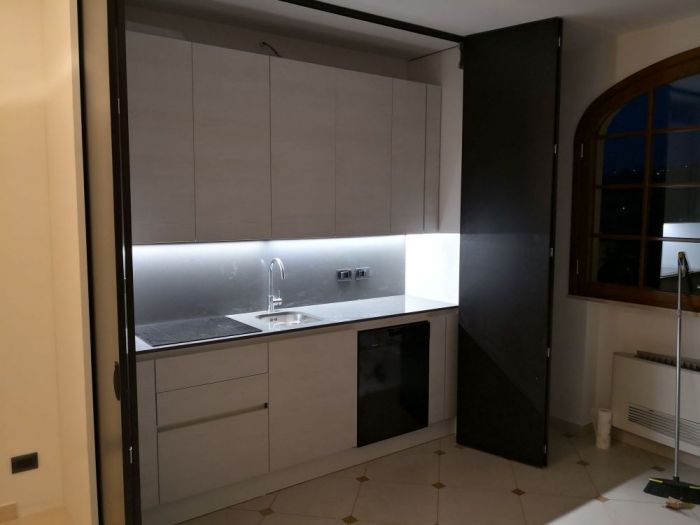 Archisio - Luigi Vasari Interior Design - Progetto Cucina a scomparsa