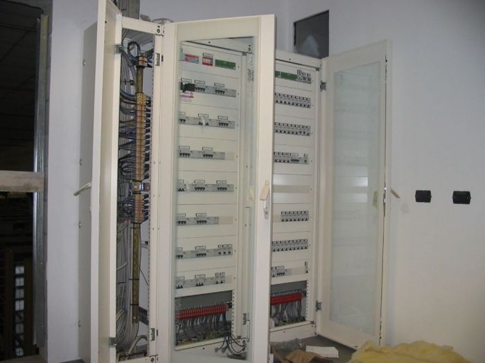 Archisio - Modernaluce Impianti Elettrici - Progetto 2004-2006 monza magazzino