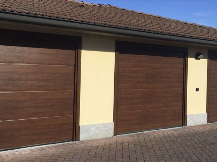 Archisio - Coel - Progetto Porte sezionali