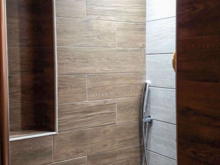 Archisio - Mc Rendering Solution - Progetto il bagno si fa in due