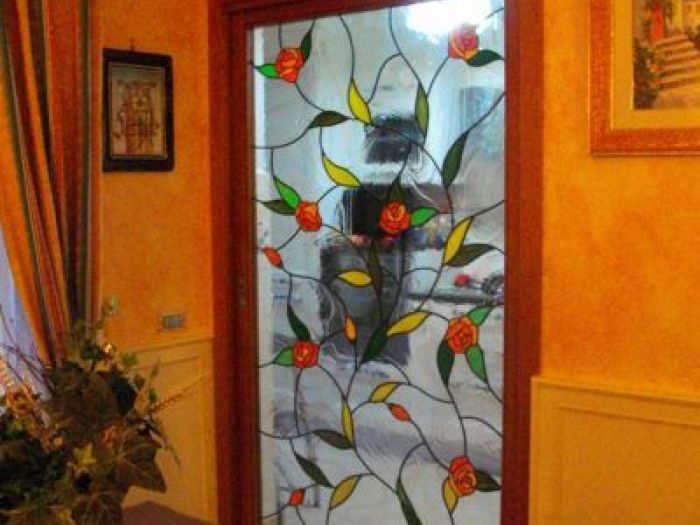 Archisio - Caleidos Creazioni Darte Snc - Progetto Vetrate per porte