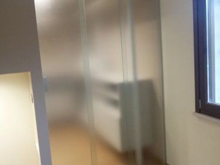 Archisio - Vetreria Dimensione Vetro - Progetto Parapetti e scale pensiline in vetro porte calpestabili e vetri decorati