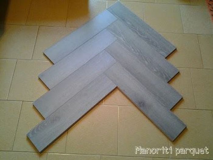 Archisio - Manoriti Parquet - Progetto Parquet laminato a lisca di pesce e parquet in olivo posato a lisca di pesce diagonale