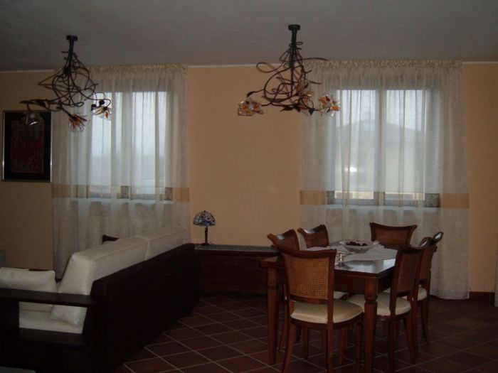 Archisio - Pezzoni Tappezzeria Tendaggi - Progetto Tende