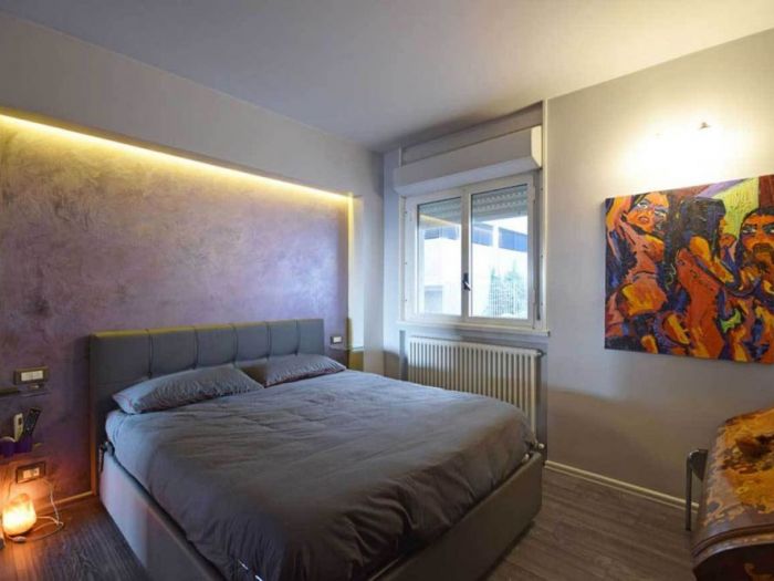 Archisio - Roberto Silvestri - Progetto Pareti in cemento luci a led e colori decisi