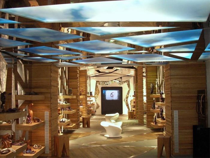 Archisio - Uno Fabbrica srl - Progetto Arredo negozi