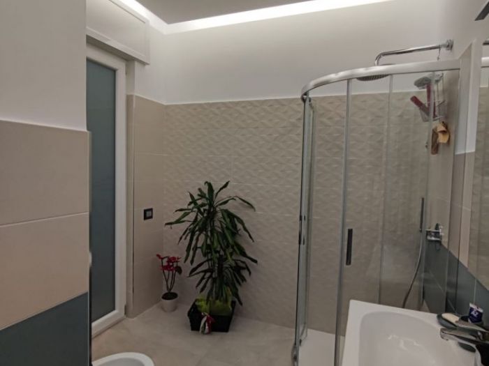 Archisio - Vincenzo Matarazzo - Progetto Ristrutturazione di una casa moderna con toni caldi ed accoglienti