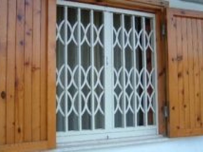 Archisio - Riparazione Serrande Lecco - Progetto Serrande e cancelletti