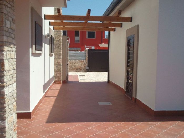 Archisio - Savino Piccolo - Progetto Pavimentazione esterna in cotto