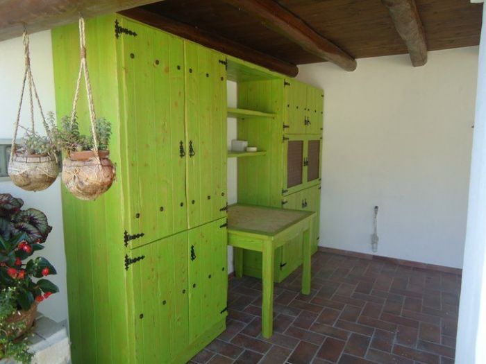 Archisio - Falegnameria Sardano Demurtas - Progetto Scaffale da esterno in legno larice invecchiato