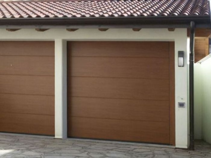 Archisio - Coel - Progetto Porte sezionali