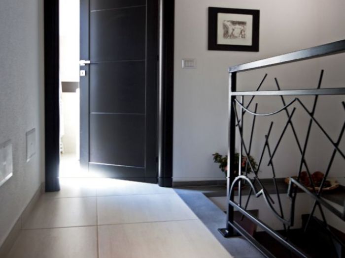 Archisio - Falegnameria Serra Figli - Progetto Lavorazioni in legno in stile moderno