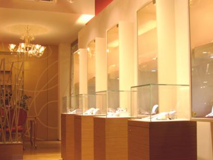 Archisio - Premiate Falegnamerie Sutrio - Progetto Spazi commerciali