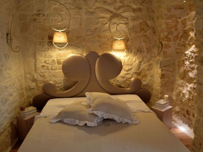 Archisio - Silvia Orlandi - Progetto Suite dimora rossi