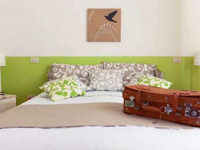 Archisio - Angela Paniccia - Progetto Profumo di lime e bamb relooking di un affittacamere